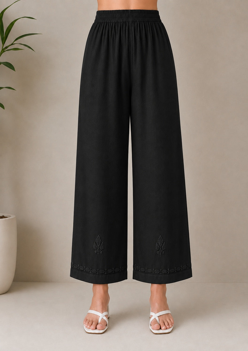 Black chikankari rayon trousers by Karicraft
