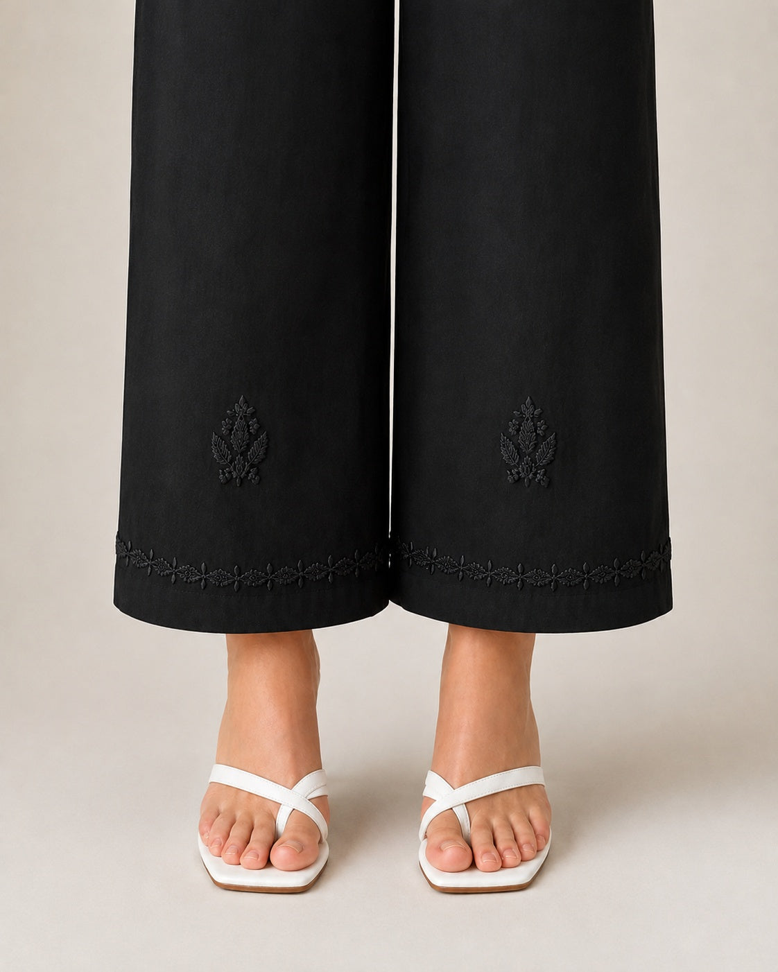 Black chikankari rayon trousers by Karicraft