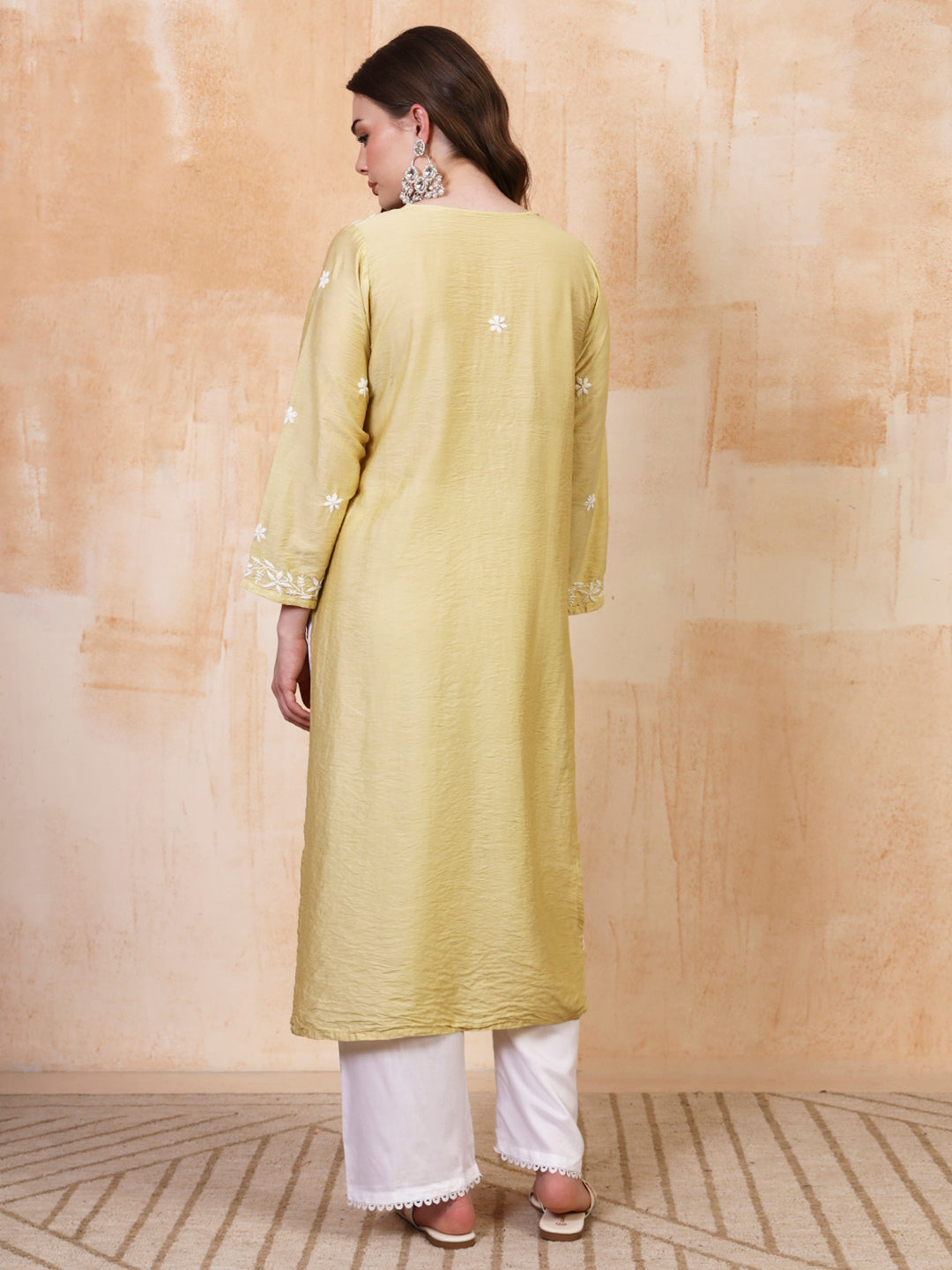 Pastel green chanderi chikankari kurta with white palazzo set by Karicraft