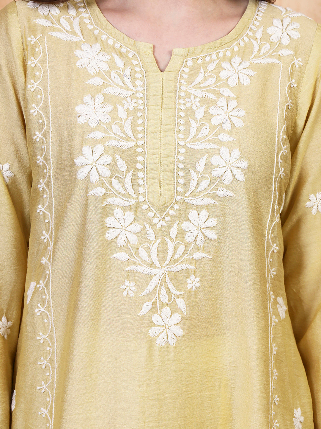 Pastel green chanderi chikankari kurta with white palazzo set by Karicraft