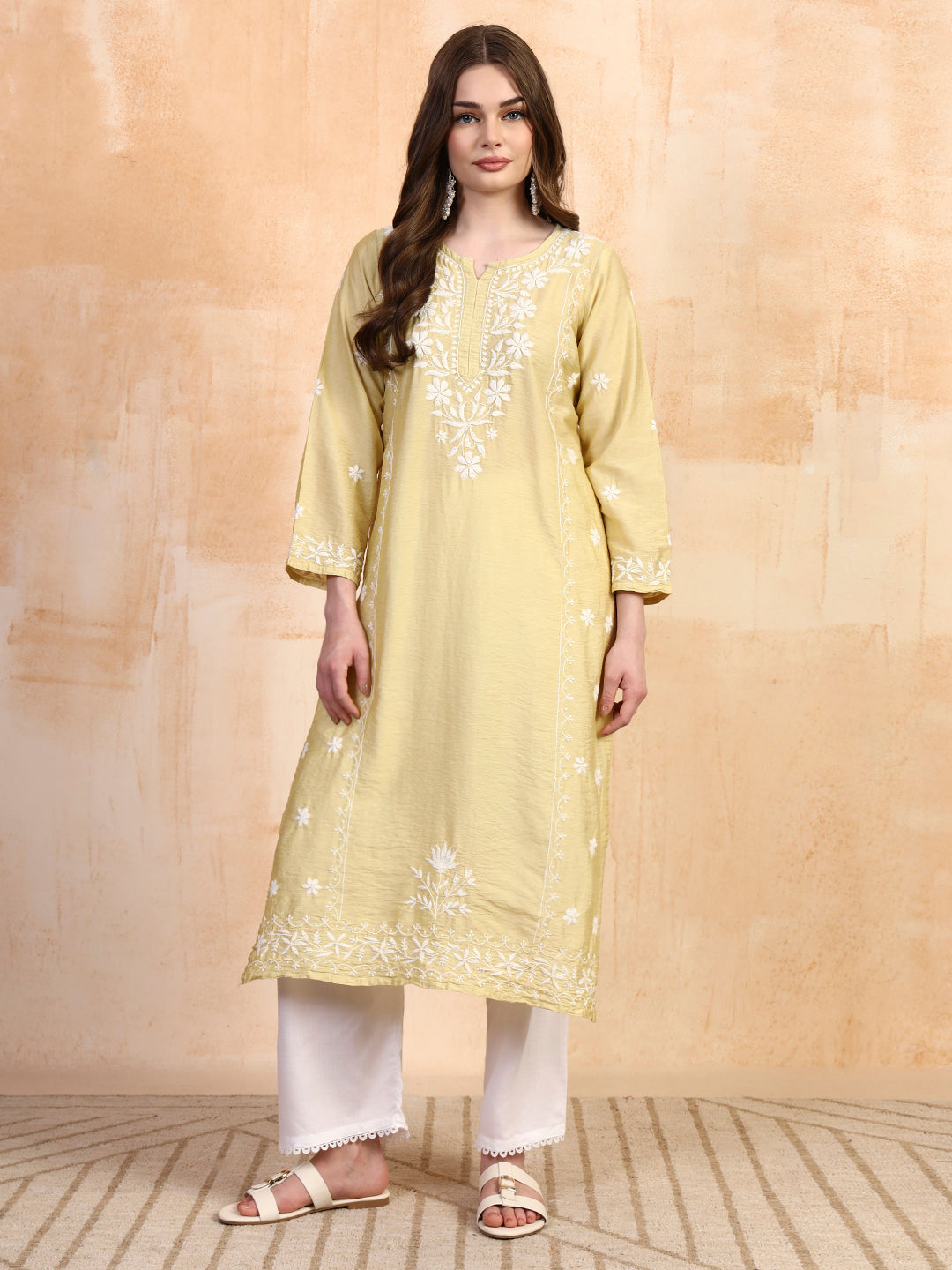 Pastel green chanderi chikankari kurta with white palazzo set by Karicraft