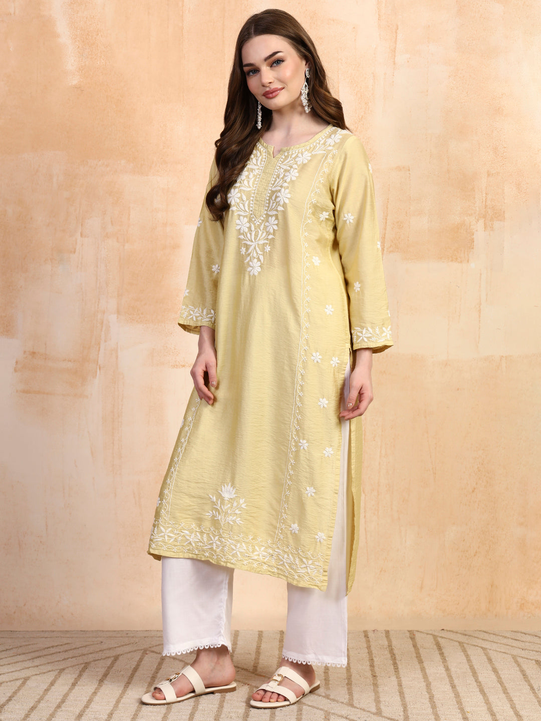 Pastel green chanderi chikankari kurta with white palazzo set by Karicraft
