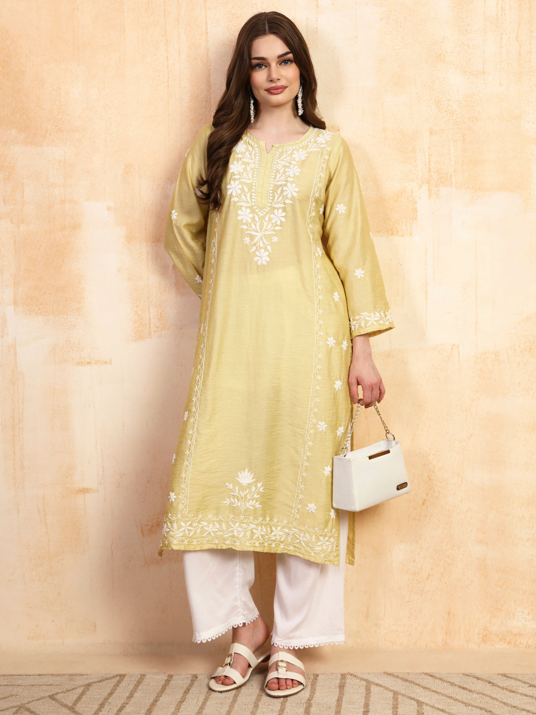 Pastel green chanderi chikankari kurta with white palazzo set by Karicraft