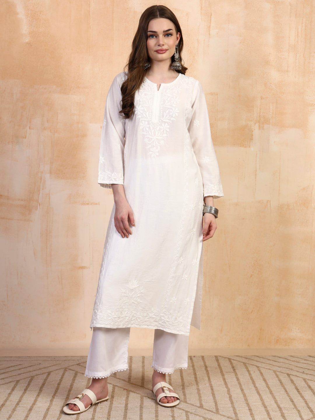 White chanderi chikankari kurta with white palazzo set by Karicraft