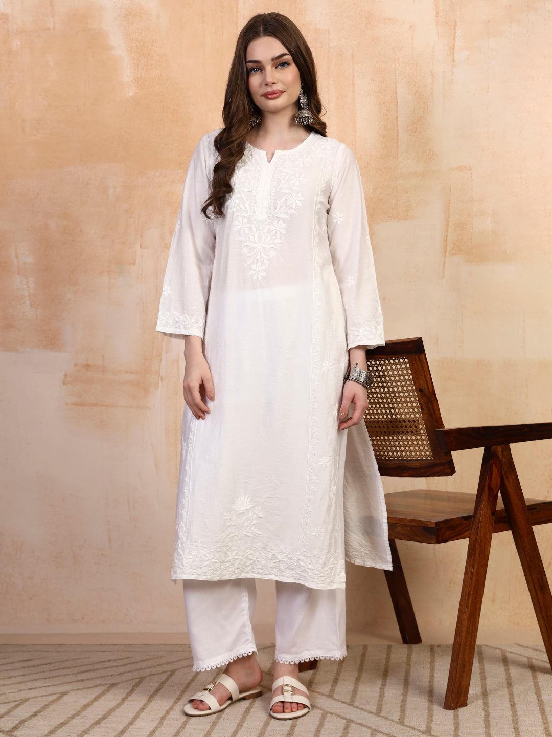 White chanderi chikankari kurta with white palazzo set by Karicraft