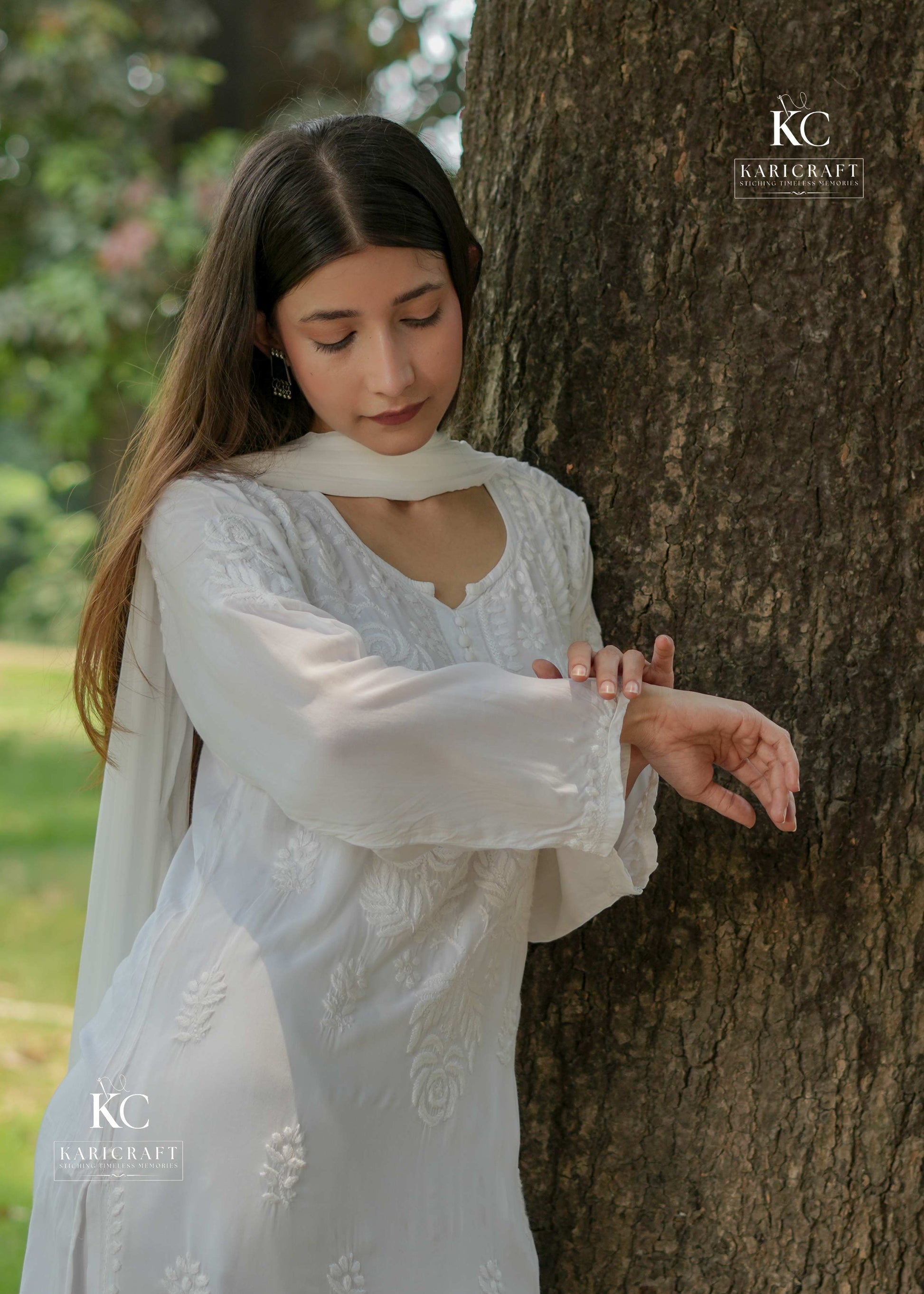 Close-up of shine staple thread embroidery on white modal fabric
